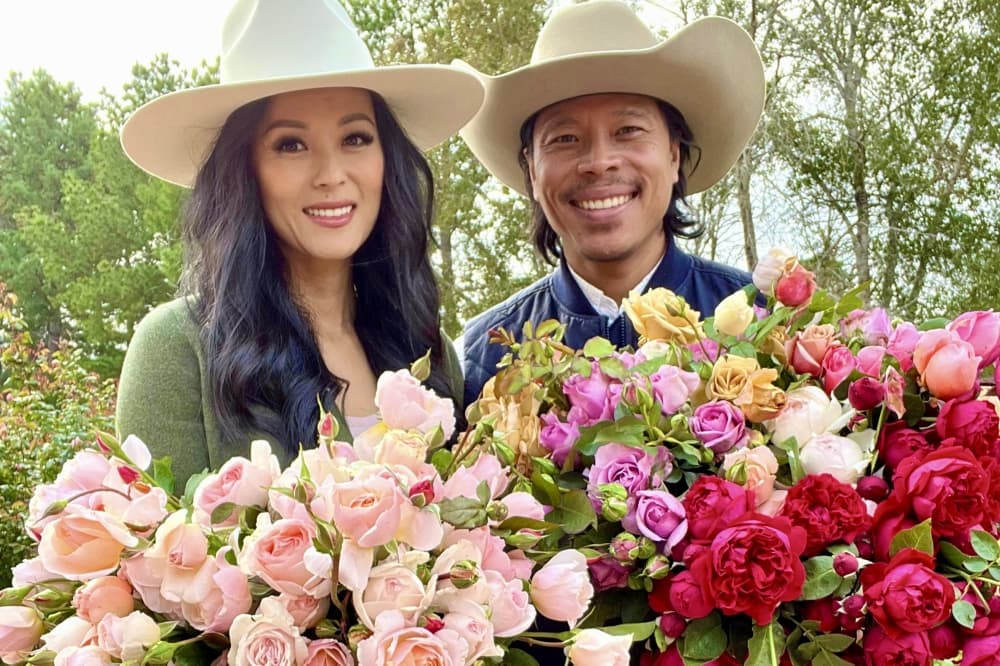 Owners holding roses