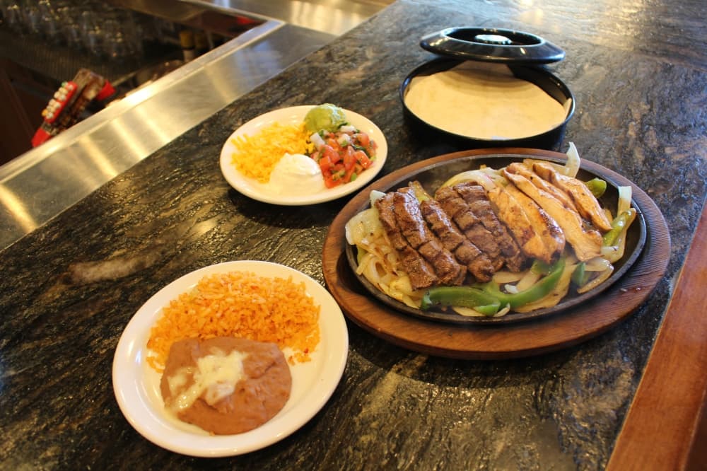Chicken and beef fajitas are one of many dishes at Mattito's. (Don Munsch/Community Impact)