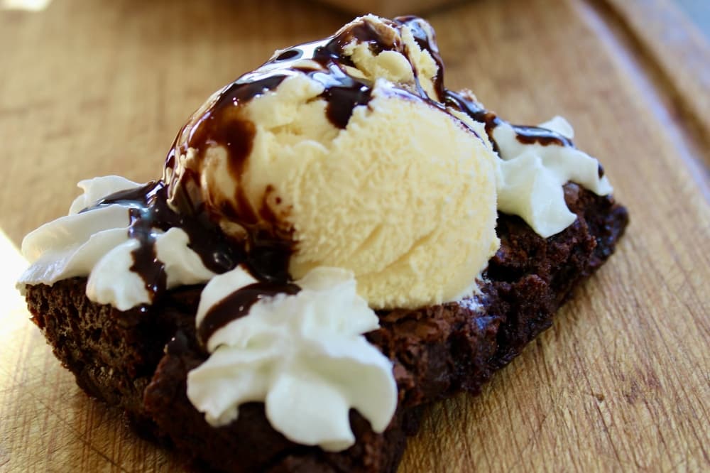 brownie with ice cream and whipped cream