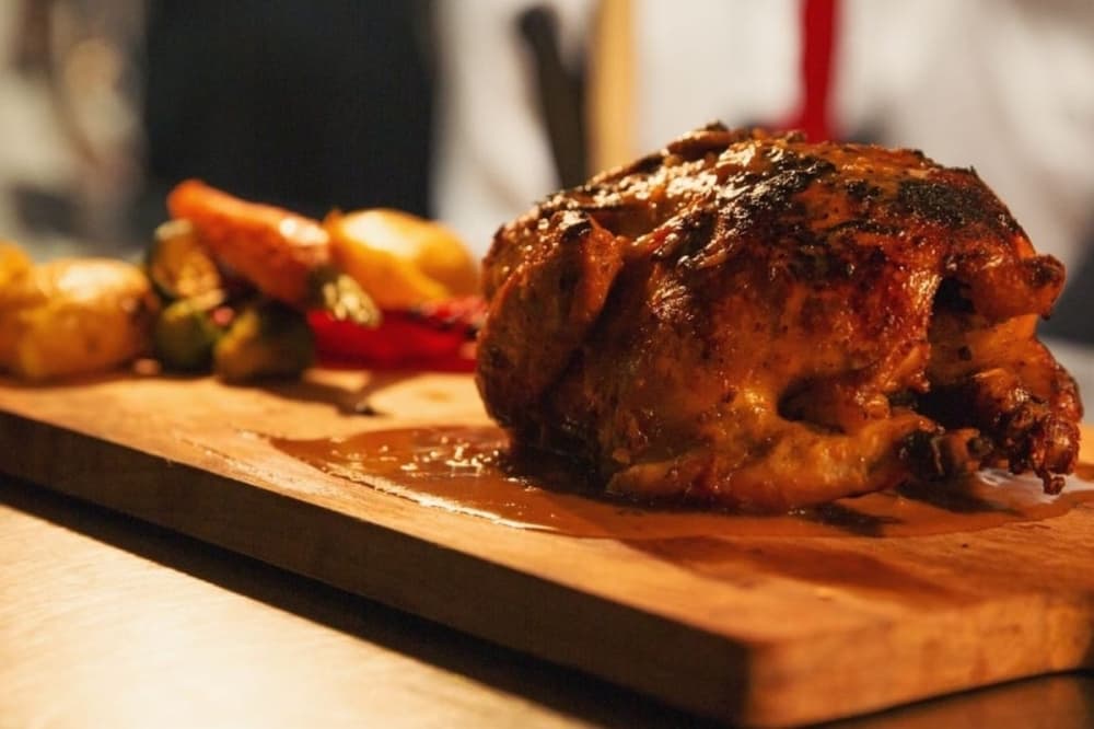 Dua Trattoria also features dishes such as the Chef's Cornish Hen, which includes the a roasted chicken and the chef's choice of vegetables. (Courtesy Dua Trattoria)