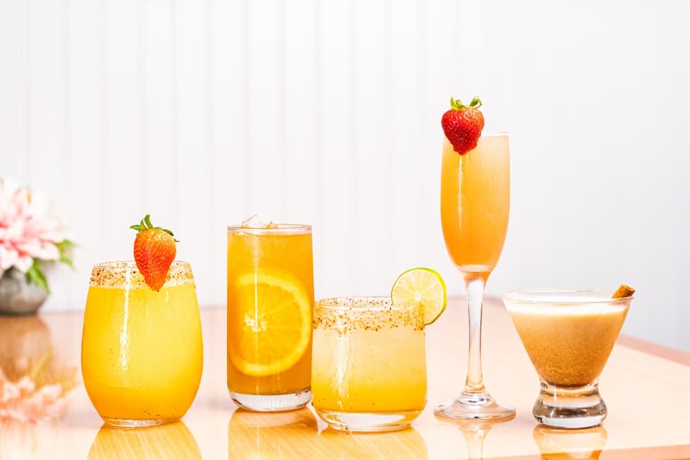 Cocktails and mimosas in glasses 