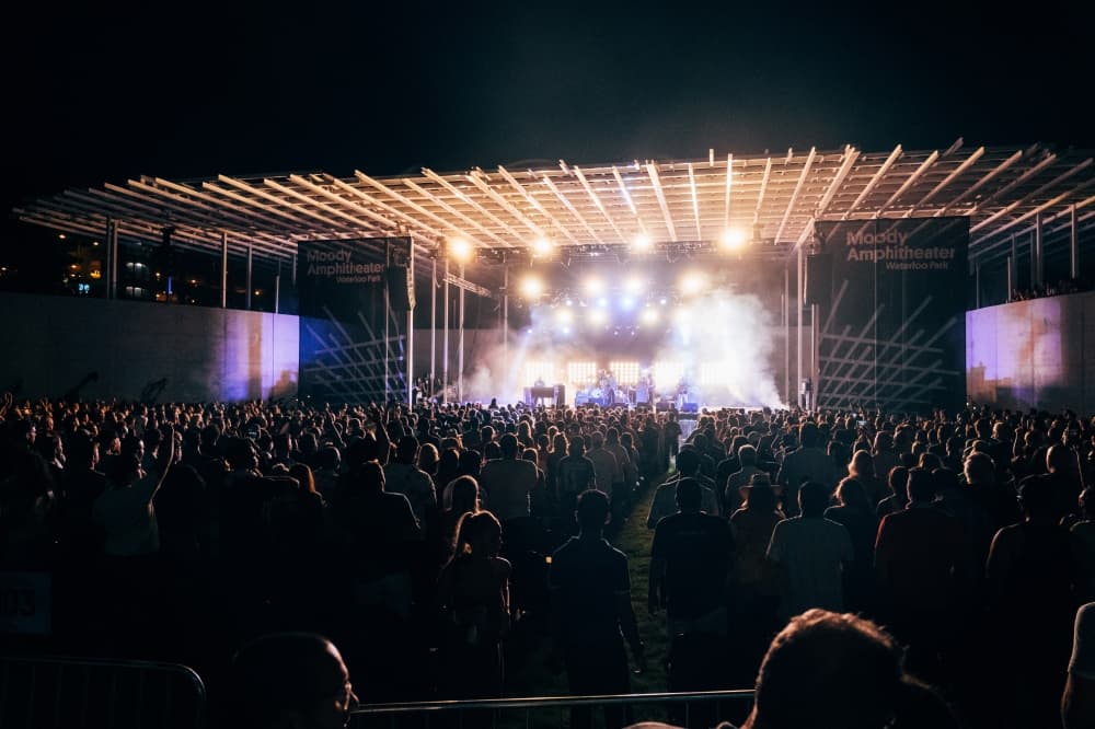A look at the Moody Amphitheater at night from the audience.