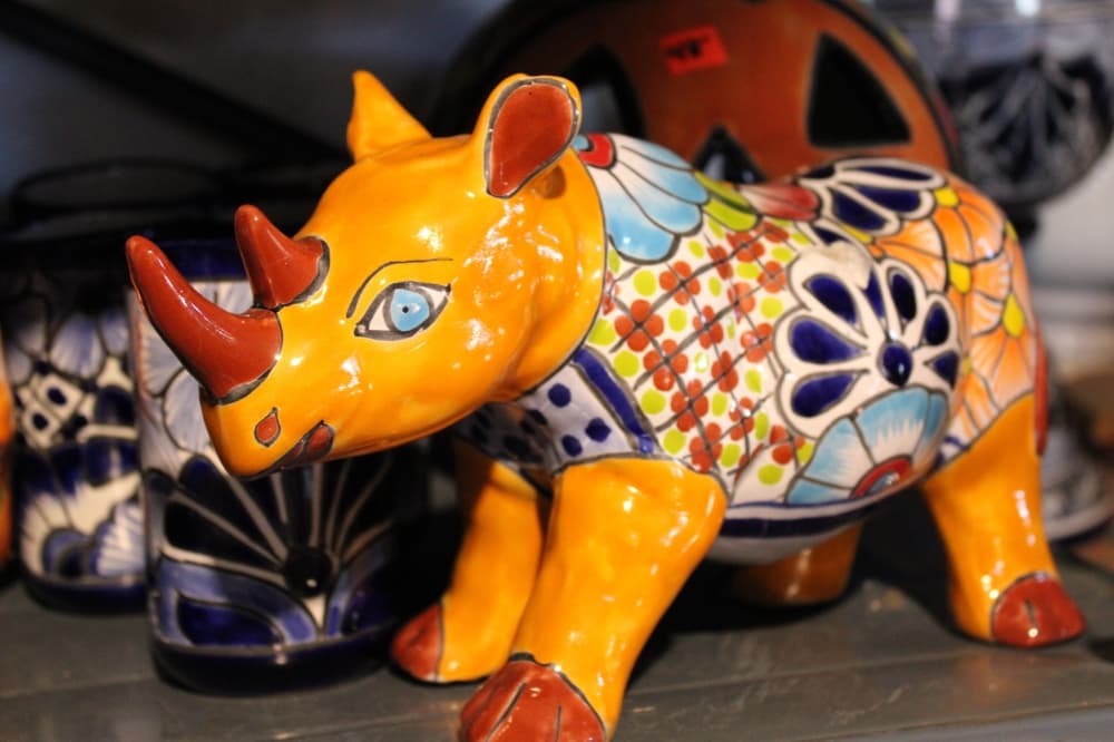 a rhino made of pottery. 