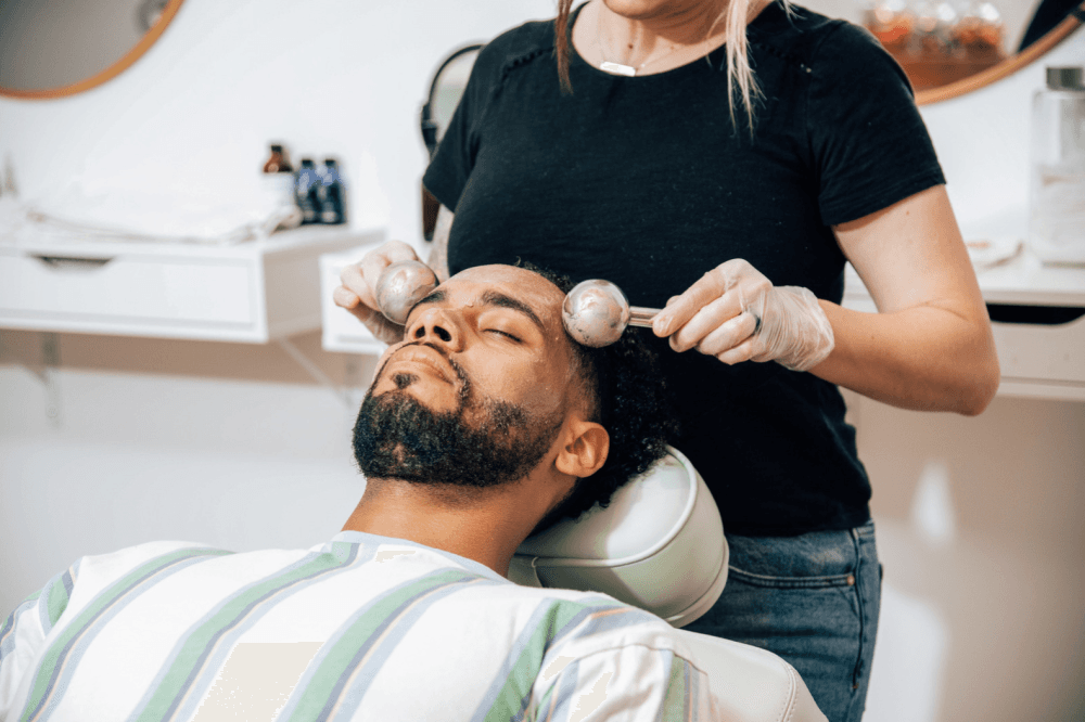 A gentleman gets a facial at Oasis Face Bar.
