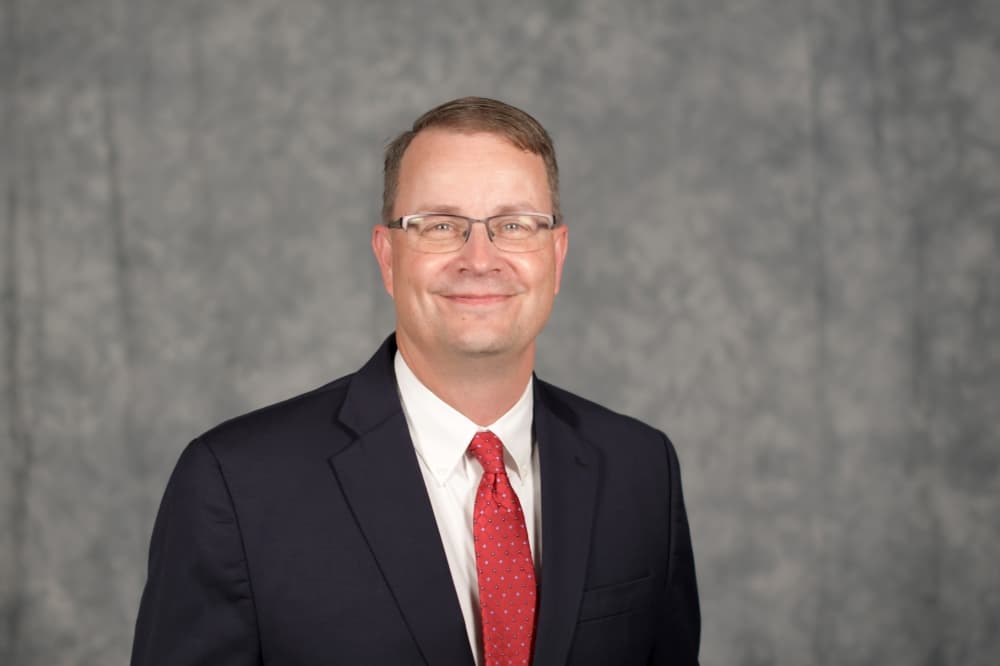 The photo shows Chad Schmidt.