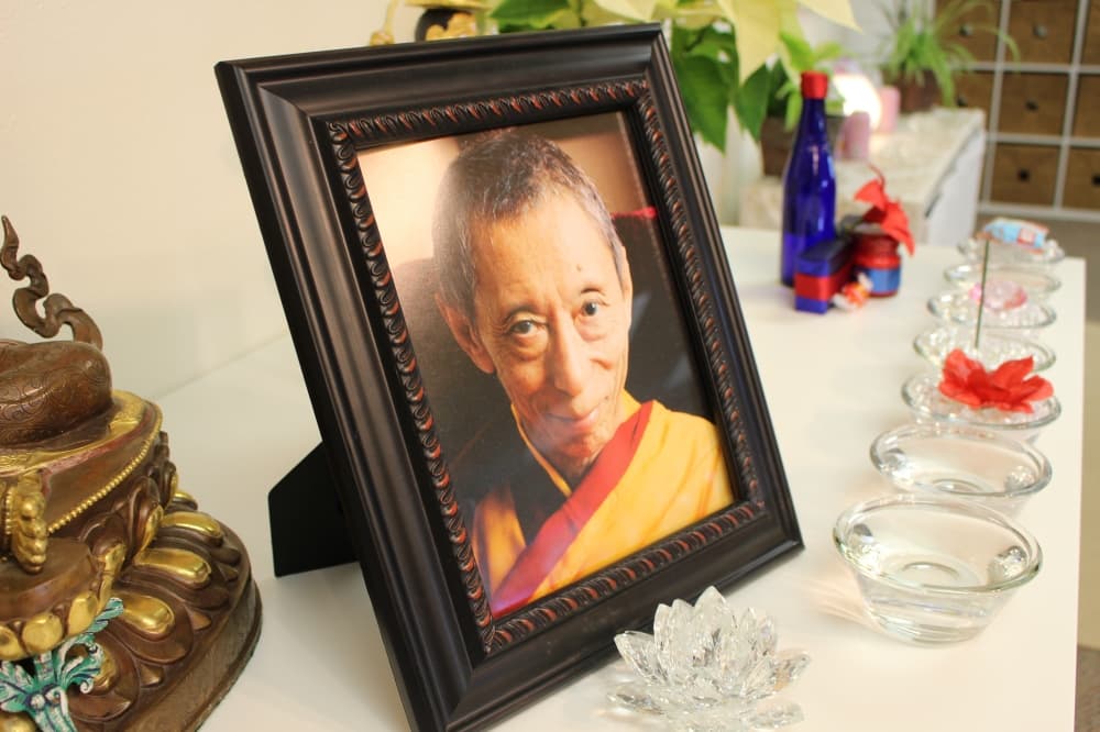 Photo of The founder of the Modern Buddhist Tradition, Venerable Geshe Kelsang Gyatso Rinpoche at meditation center. 