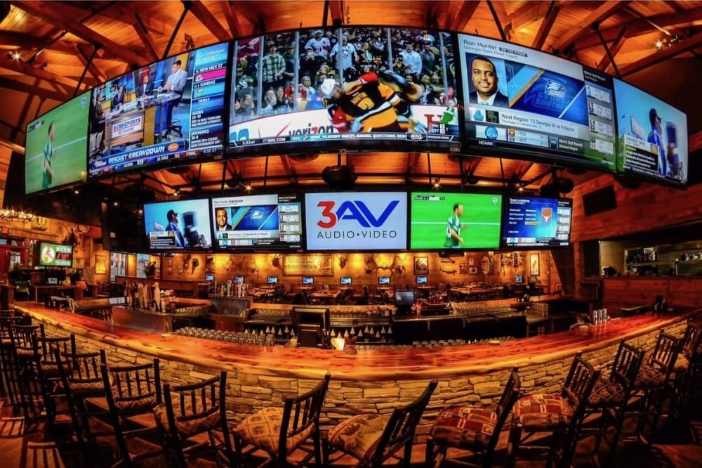 Twin Peaks bar with rows of televisions