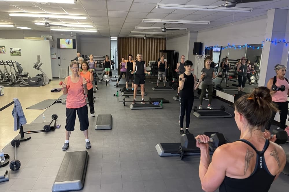 A class of adults working out.
