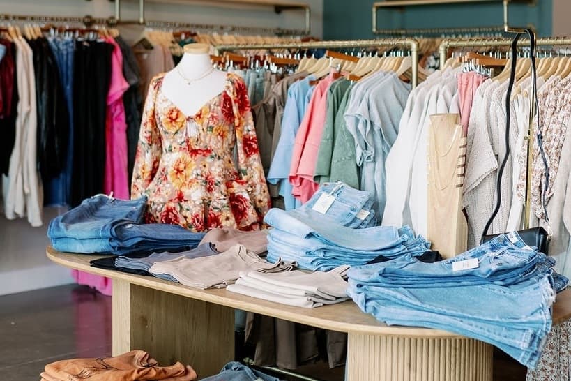 A display table of women's clothing