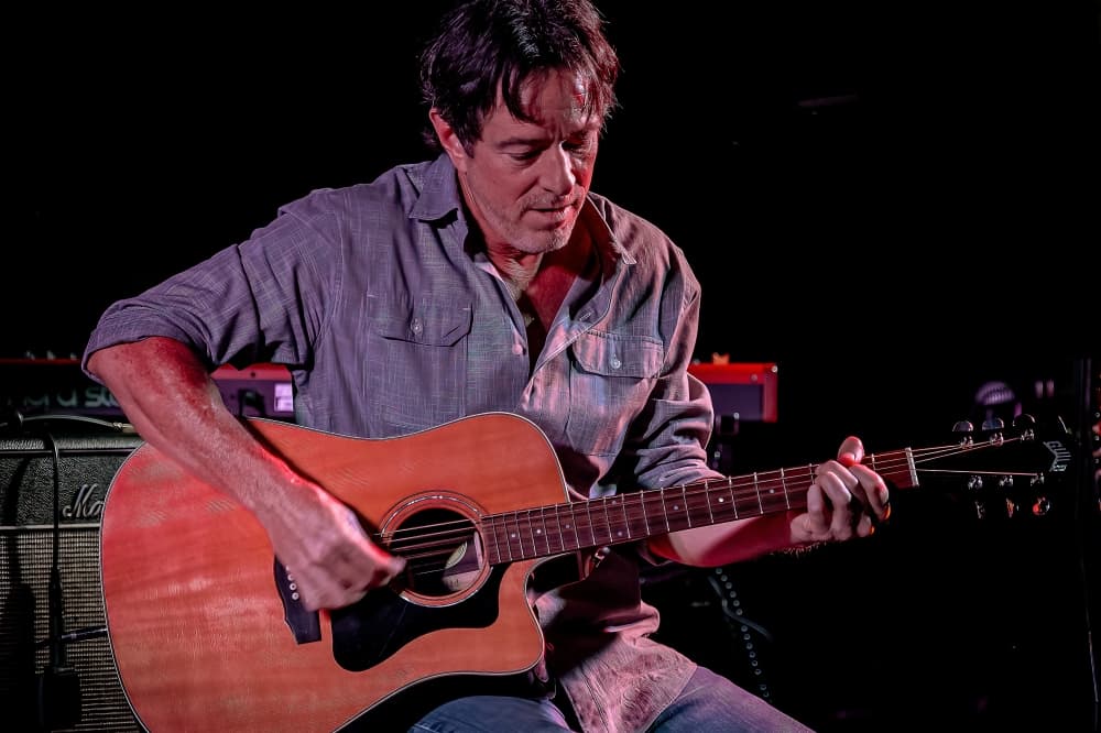 man playing guitar