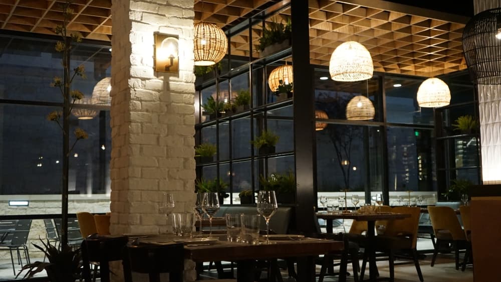 The interior dining room with lamps hanging