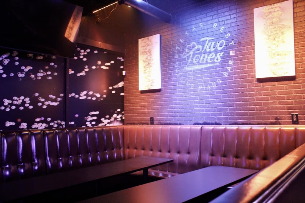 Two Tones Dueling Piano Bar table inside