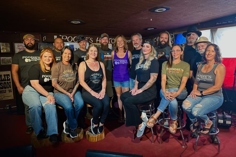 a group of people pose together for a photo