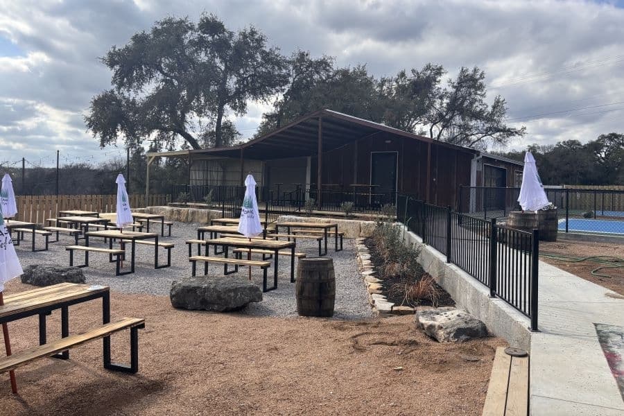 An outdoor space with patio tables