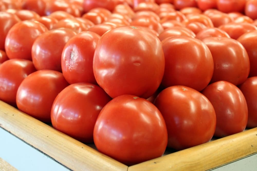 Stacked red tomatoes. 