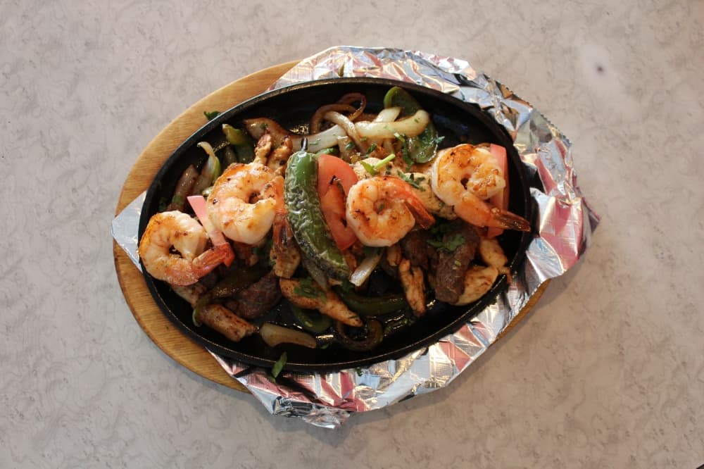 shrimp, chicken and beef fajitas