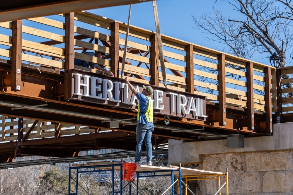 New sign marks milestone in Heritage Trail West project