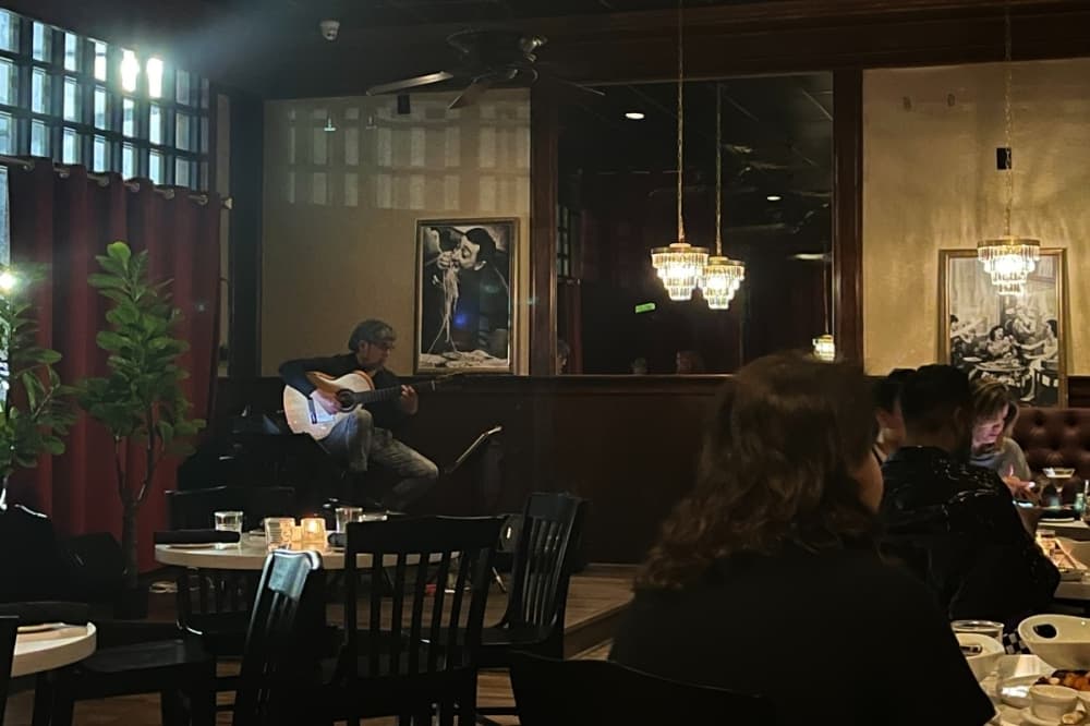 man playing a guitar 