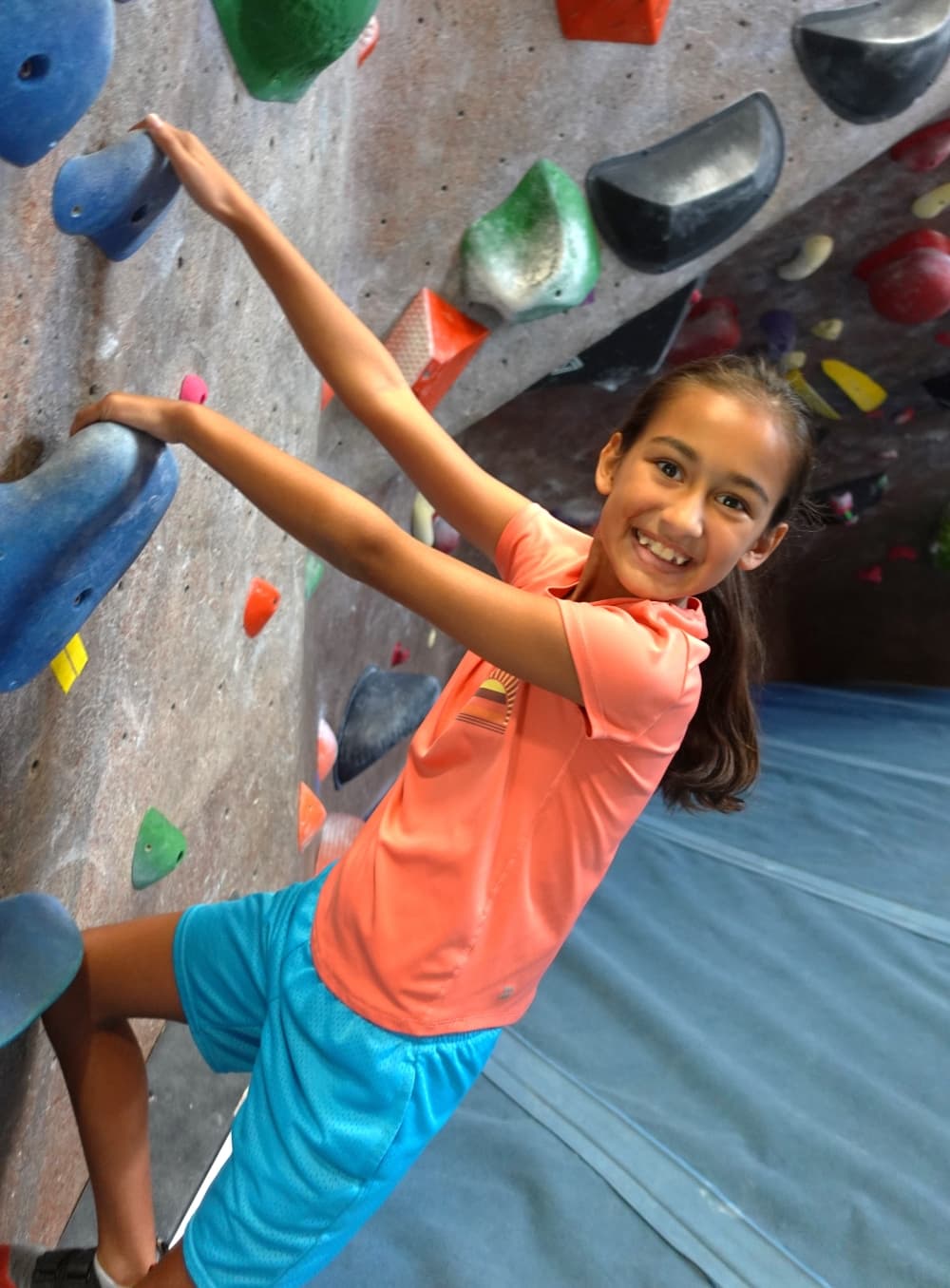 child rockclimbing