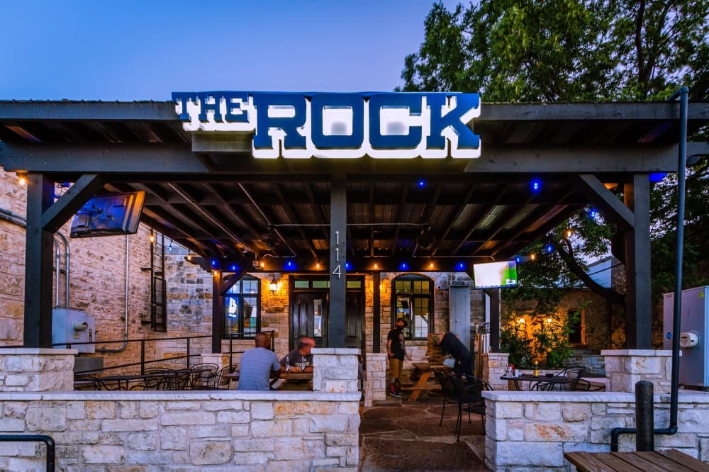 At The Rock, patrons can enjoy over 20 TVs playing a variety of sports, arcade games, darts, a patio and a full service bar with brunch and dinner food options. (Courtesy The Rock Sports Bar)