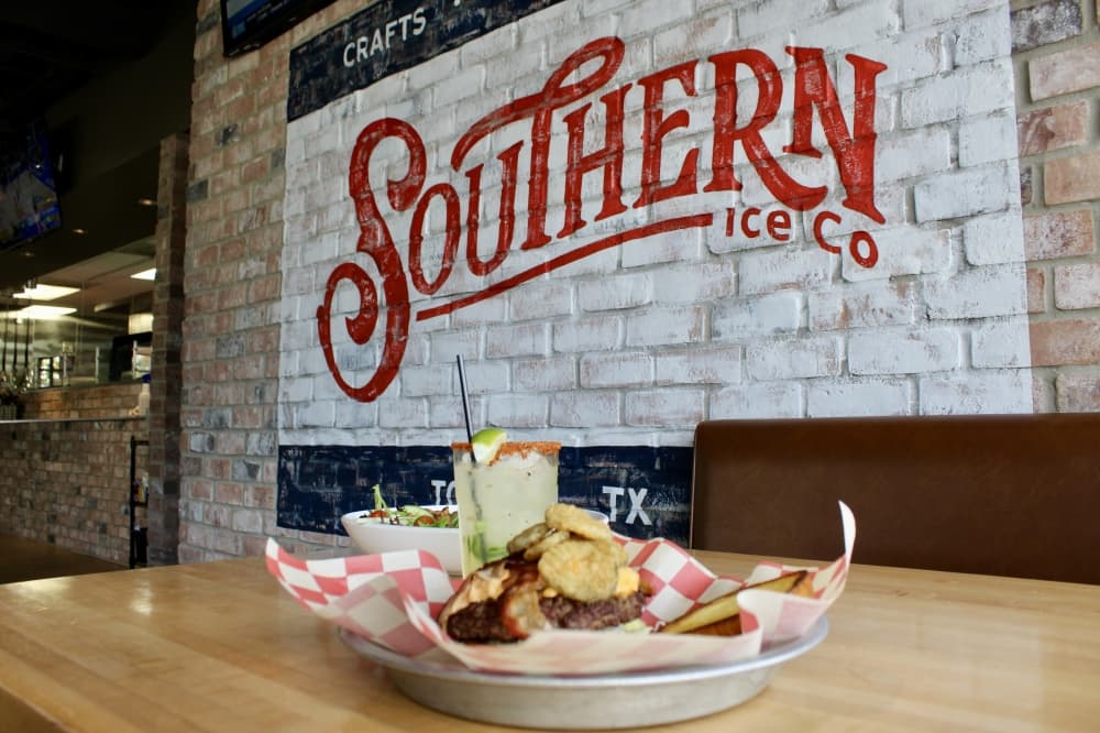 A plate of food in front of a sign that says "Southern Ice Co."