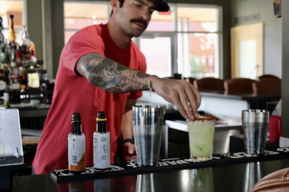 Bartender making drink