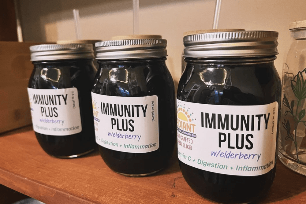 Three jars of Immunity Plus are pictured.