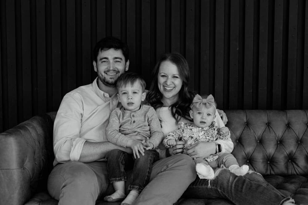 Family of four black and white photo