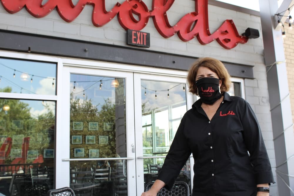 A woman outside a restaurant