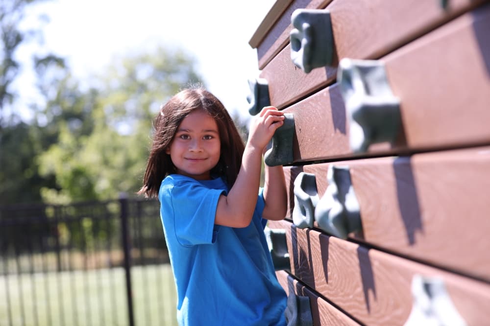 Kid on a playground structure