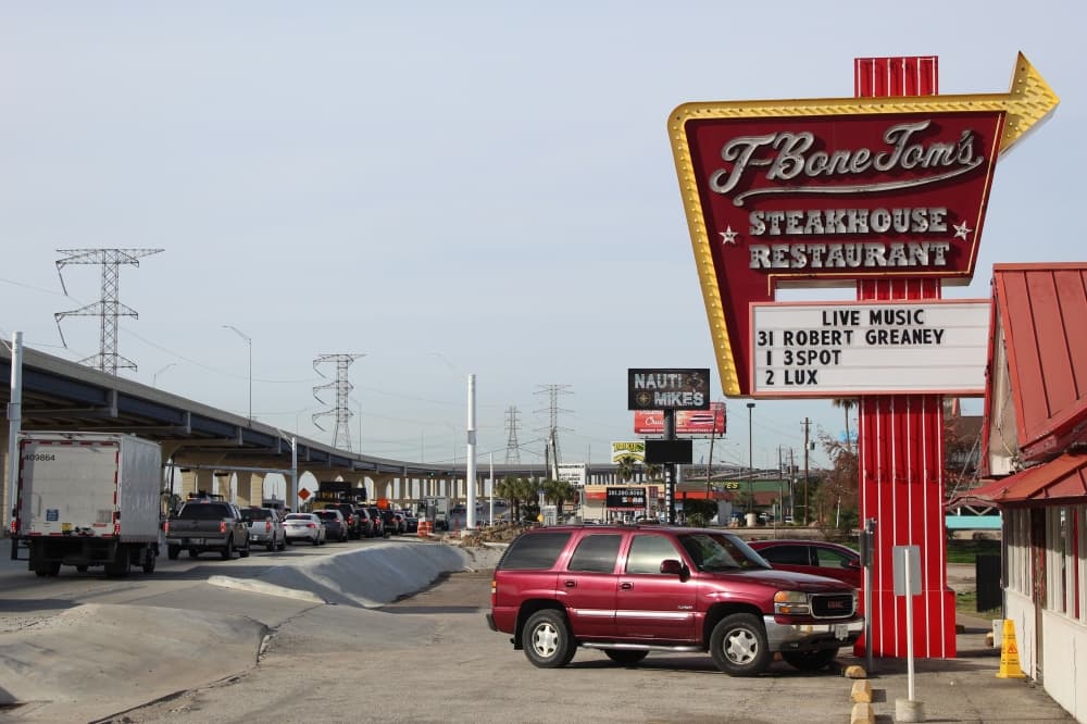 With Hwy. 146 widening project wrapping up, project creates hope for community officials, while business owners reflect on issues