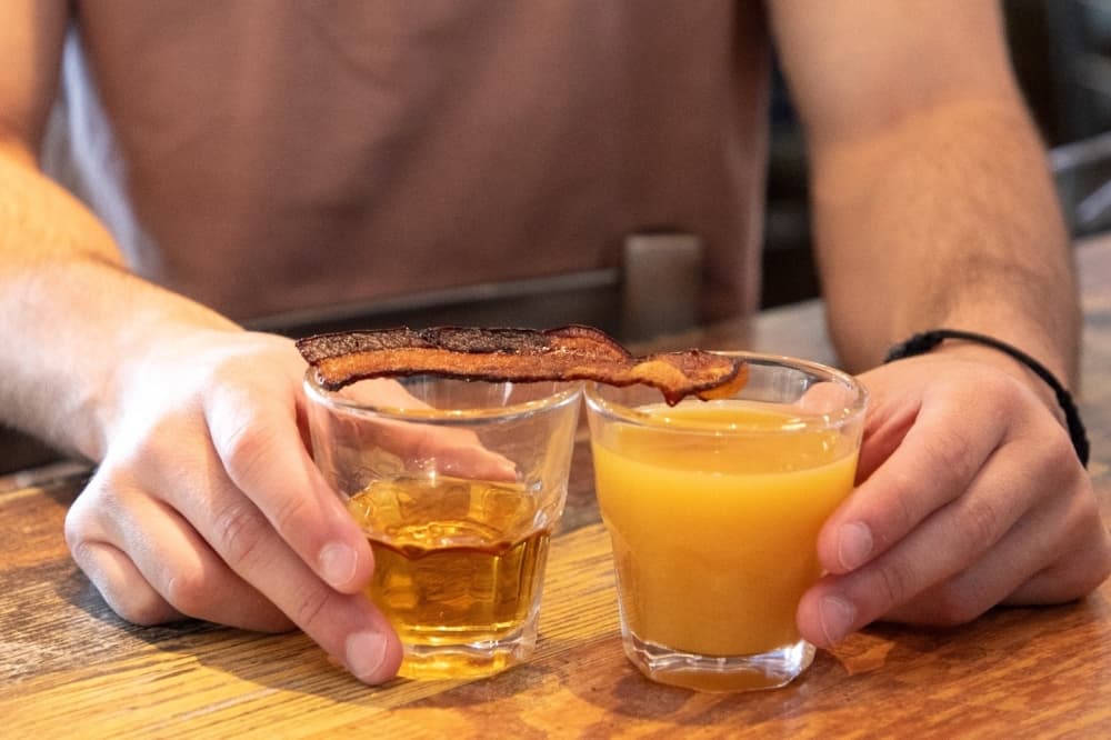 A menu item called The Breakfast Shot; whiskey, butterscotch schnapps, orange juice, bacon. (Courtesy Spectators Bar & Grill)