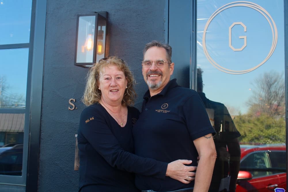 two people pose together 