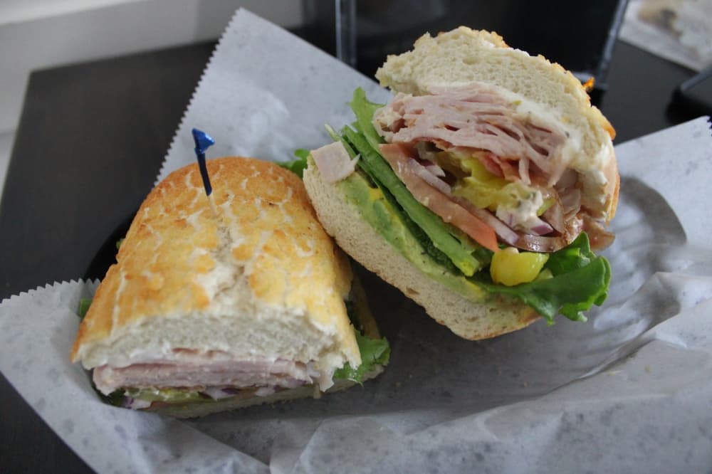 The Shark Tank ($11.99) features turkey, avocado, bacon, bomb sauce and cream cheese. (Dustin Butler/Community Impact)