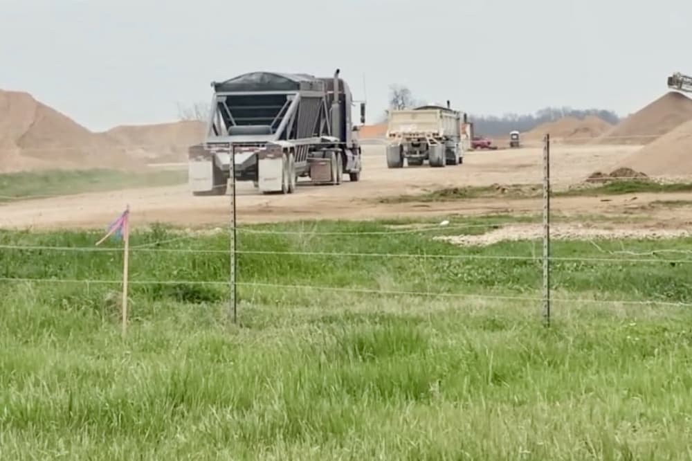Trucks in a gravel mine.