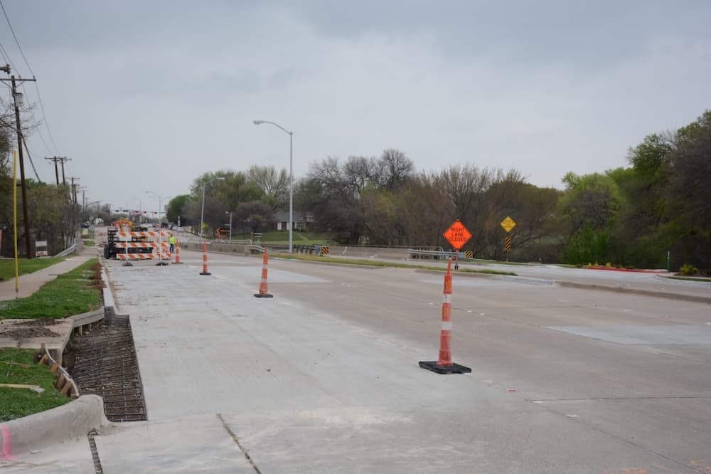 Construction teams work on segment of Alma Drive