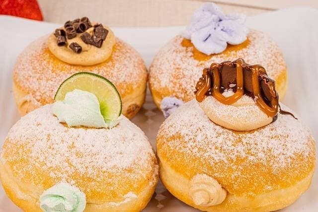 Four decorated donuts 
