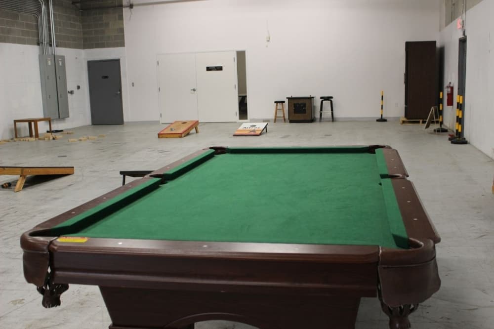 pool table and cornhole