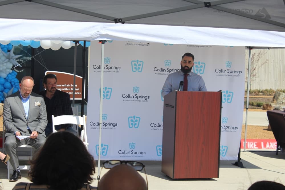 Speaker at Collin Springs grand opening