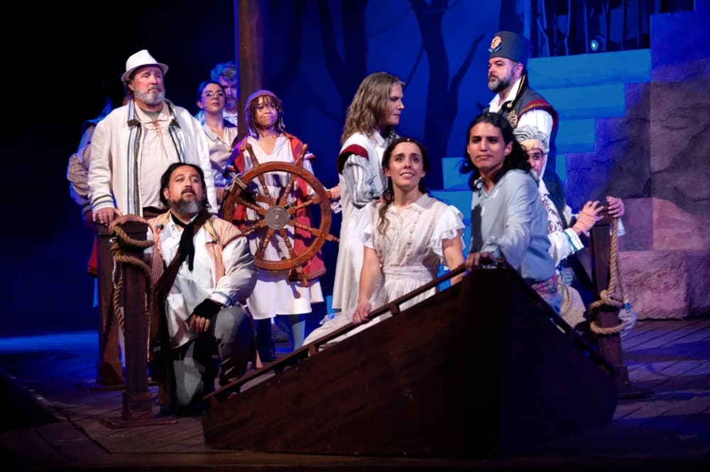 Group of performers on stage.