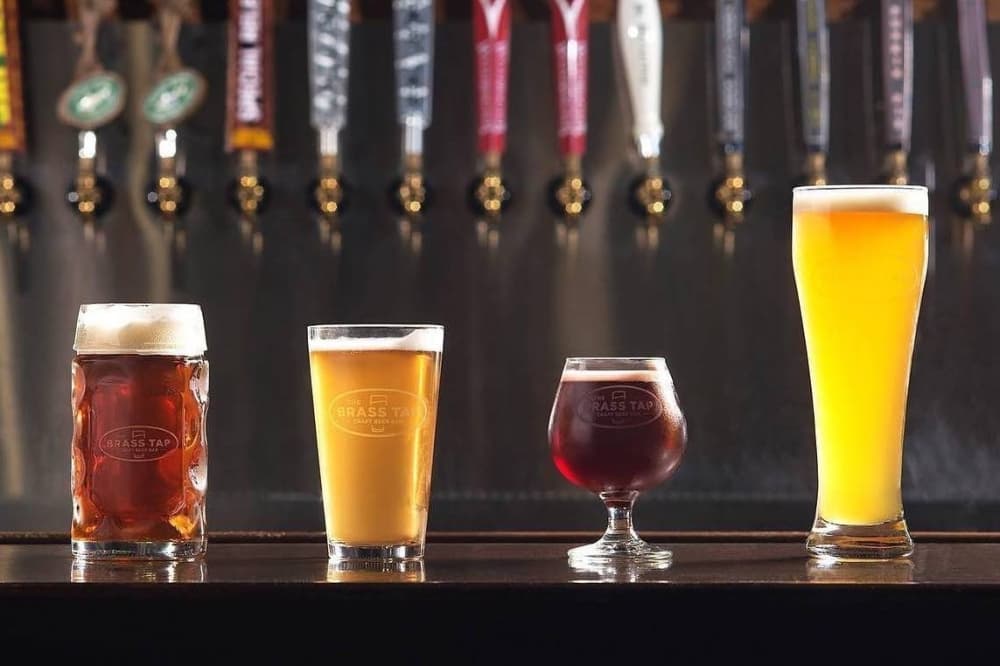 The Brass Tap features full bar, craft kitchen in Plano