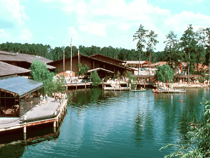 A vintage photo of buildings on a lake