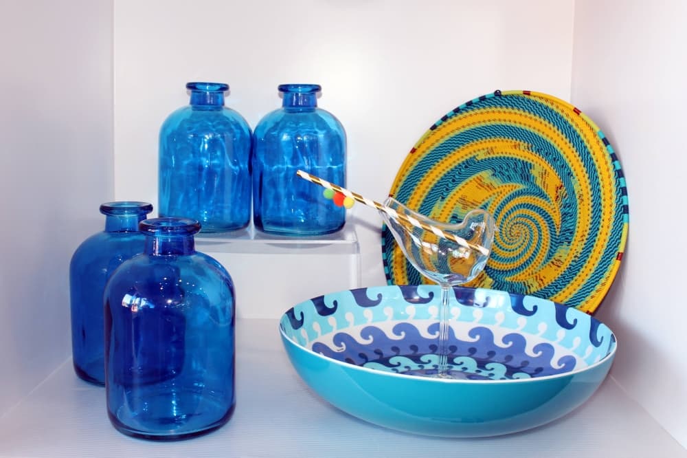 Decorative houseware items mostly in shades of blue.