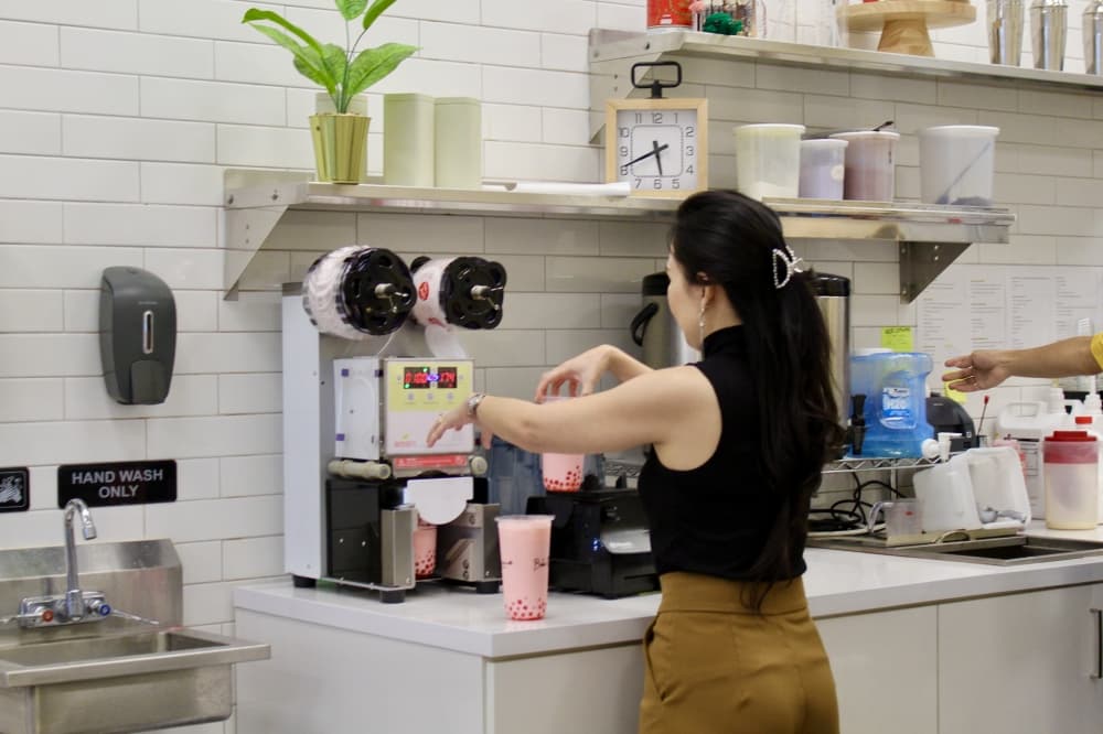 Owner making smoothies