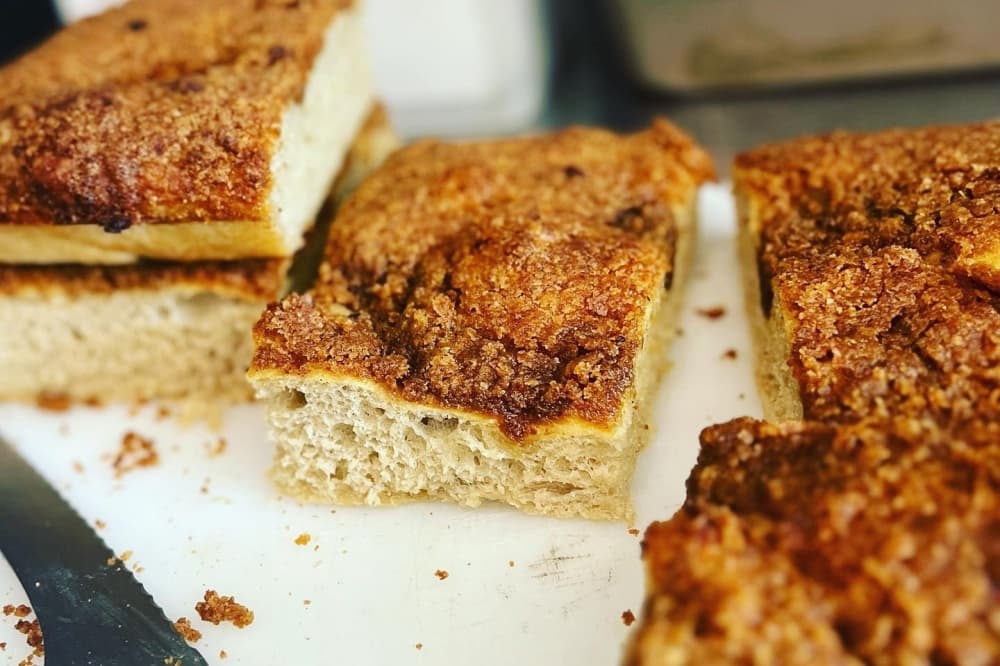 The coffeecake is shown cut into squares.