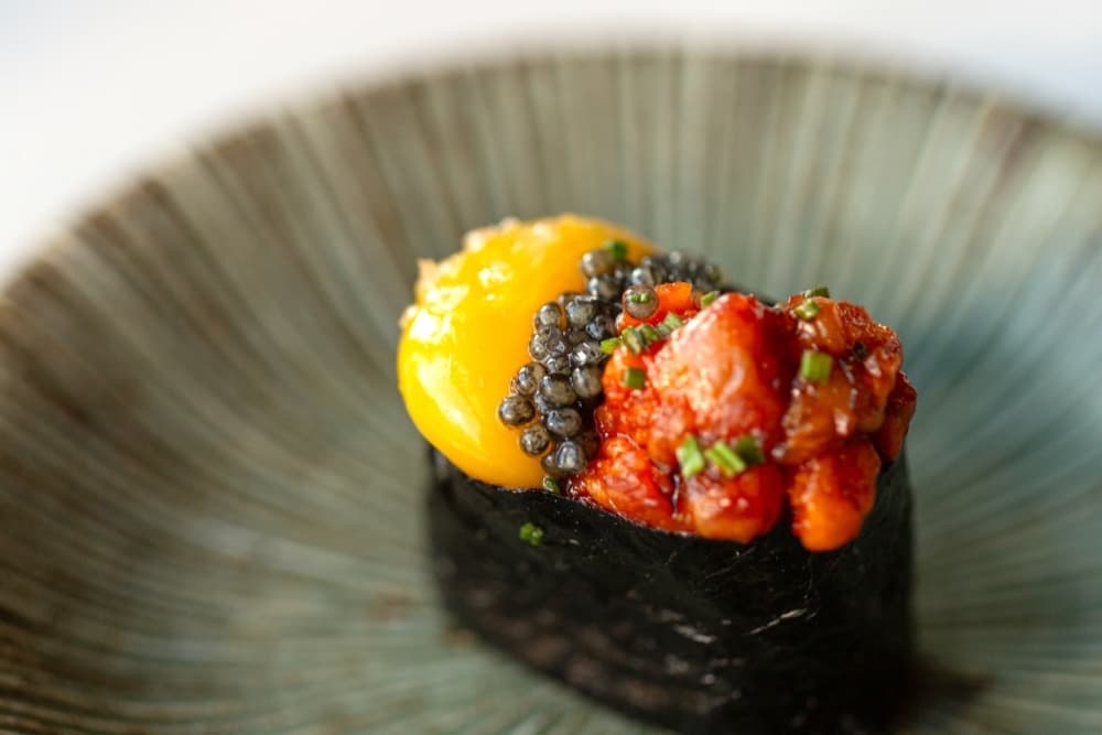 Tartar nigiri served on a plate.