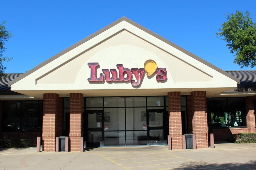 Outside of a building with Luby's signage. 