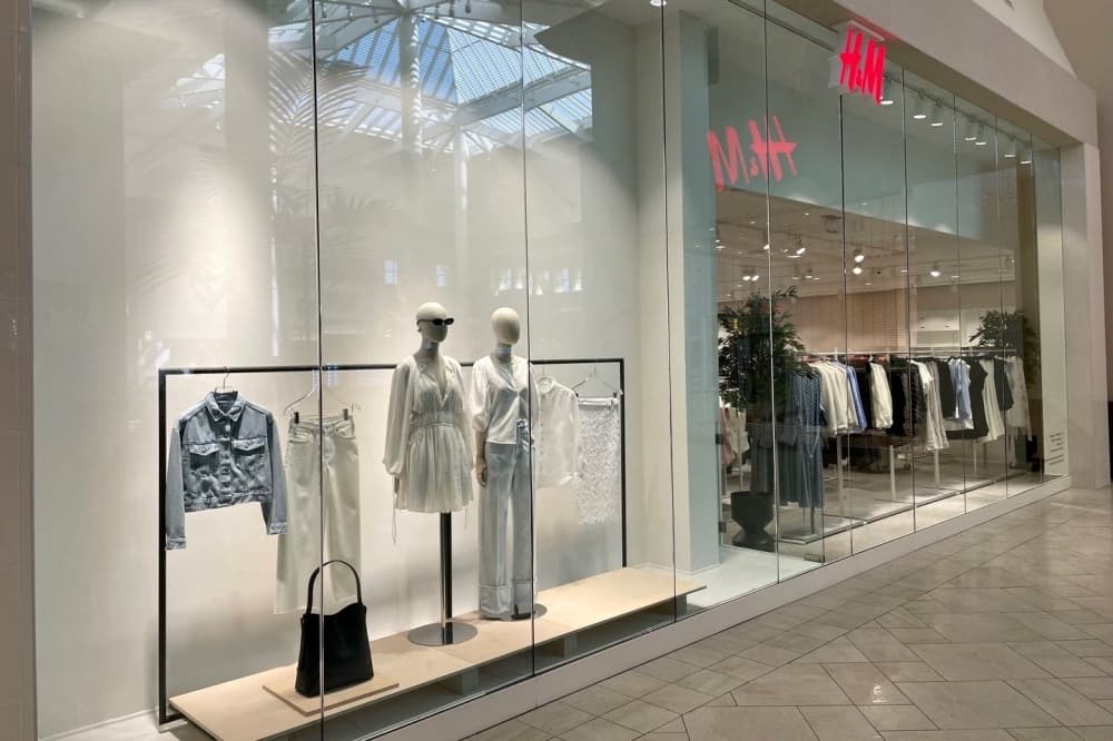 H&M storefront with mannequins 