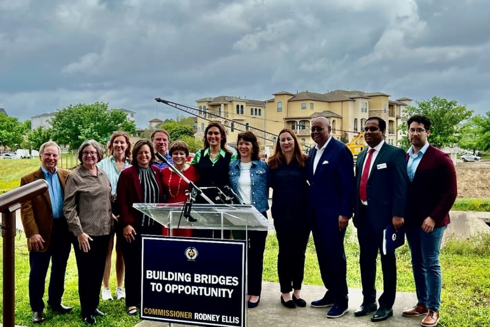 A photo of county, state and local officials at the bridge construction site.
