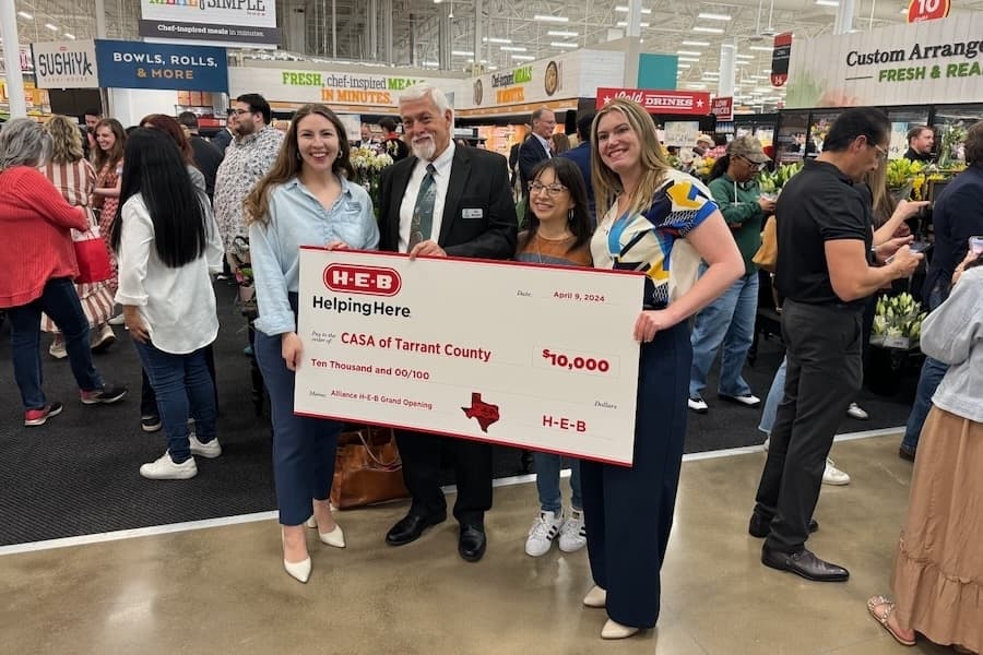 Two $10,000 donations were made at the April 9 ribbon-cutting ceremony of the H-E-B in north Fort Worth. (Mark Fadden/Community Impact)